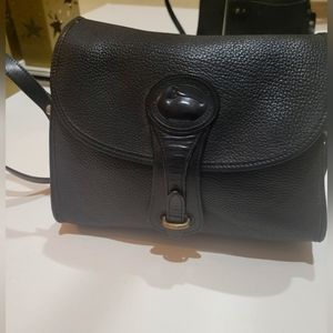 Vintage Dooney and Burke All-Weather Leather black shoulder bag.